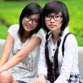 网络安全顾问小林的头像照片，年轻女性微笑自信，办公室背景